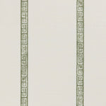 Detail of a linen fabric in a minimal geometric linear pattern in sage on a cream field.