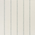 printed linen fabric in a minimal geometric linear pattern in dusty blue on a cream field.