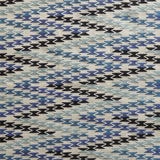 Patterned fabric with black, blue, and gray design
