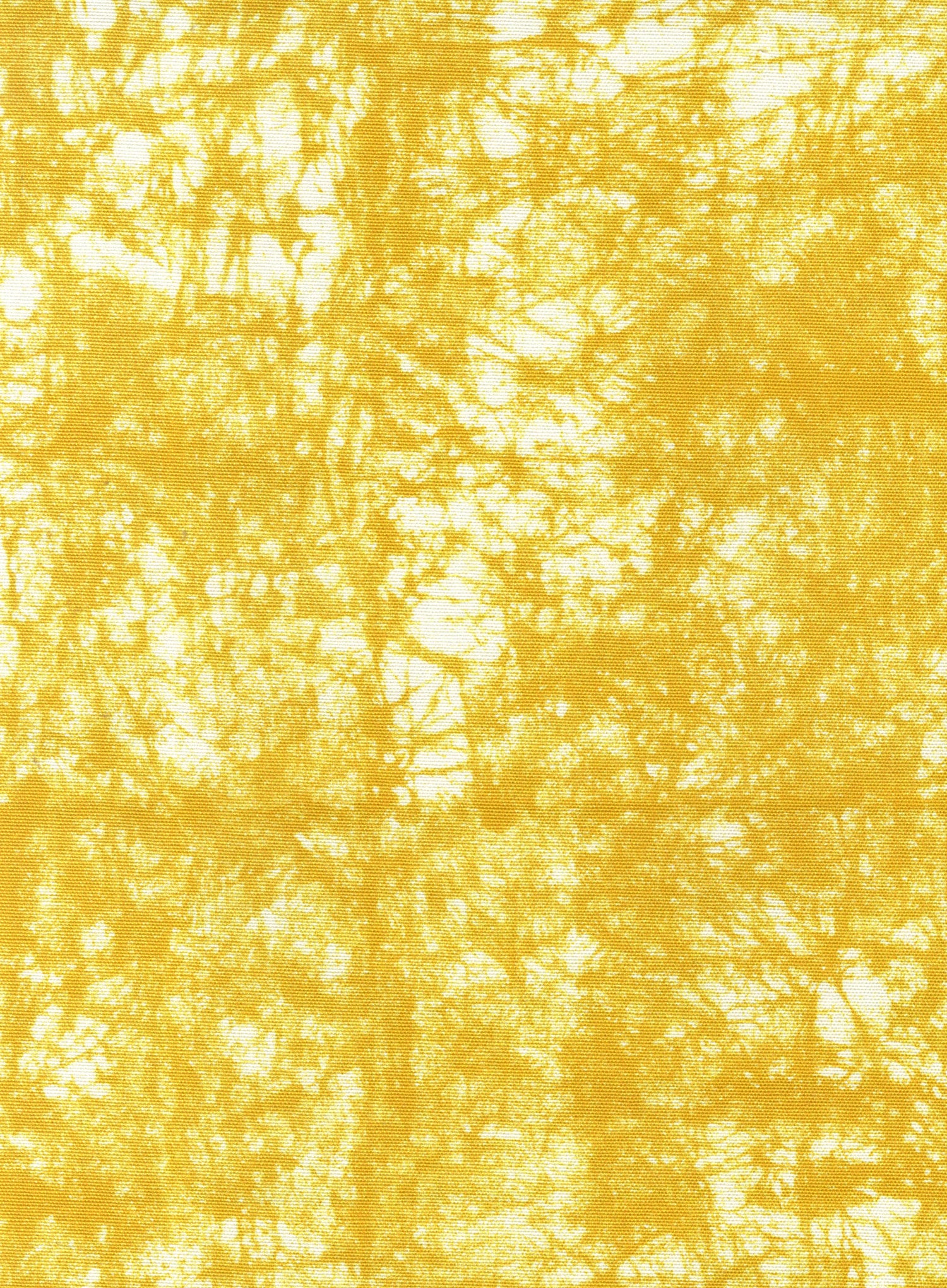 Detail of fabric in a textural splatter print in yellow on a cream field.