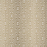 Broadloom carpet with triangle pattern with an ombré background in shades of tan.