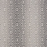 Broadloom carpet with triangle pattern with an ombré background in shades of grey. 