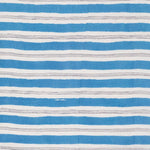 Detail of fabric in a painterly striped pattern in gray and blue on a white field.