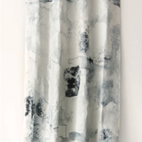 White curtain with black abstract pattern on a white background