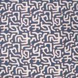 Fabric in an abstract meandering shape print in white and purple on a navy field.