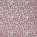 Fabric in an abstract meandering shape print in white and sage on a pink field.