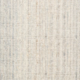 Broadloom carpet in a textural strie in cream accented with pastel blue and tan.