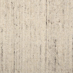 Broadloom carpet in a textural strie in cream accented with dark and light grey.