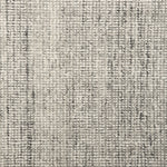 Broadloom carpet in a textural strie in silver with darker grey accents.
