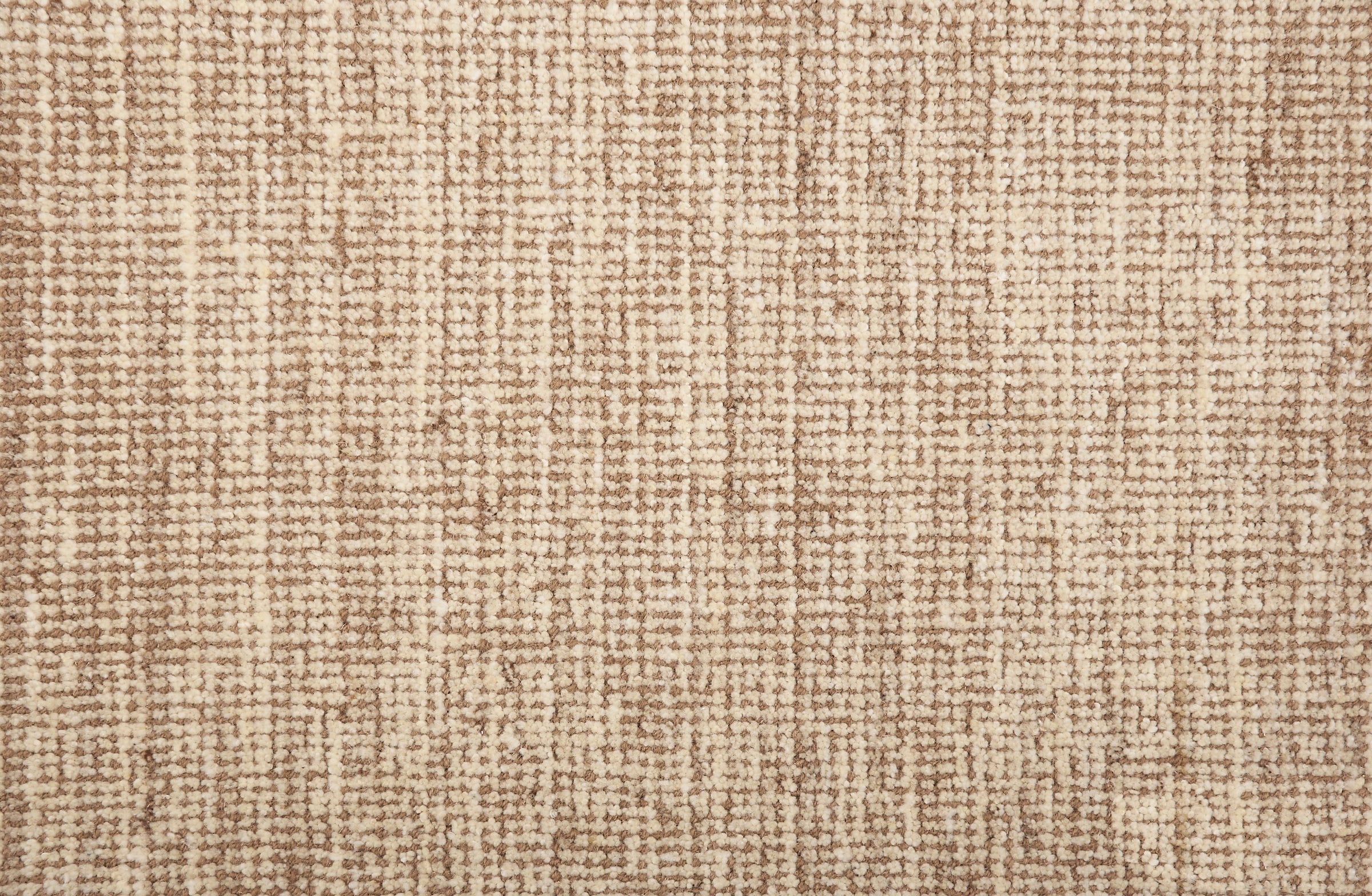 Broadloom carpet in a textural strie in warm shades of tan and taupe.