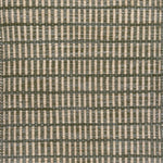 Textured rug with a sage green and beige  checker pattern