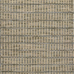 Textured rug with a grey and beige checker pattern
