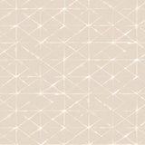 Detail of fabric in a mottled lattice print in white on a cream field.