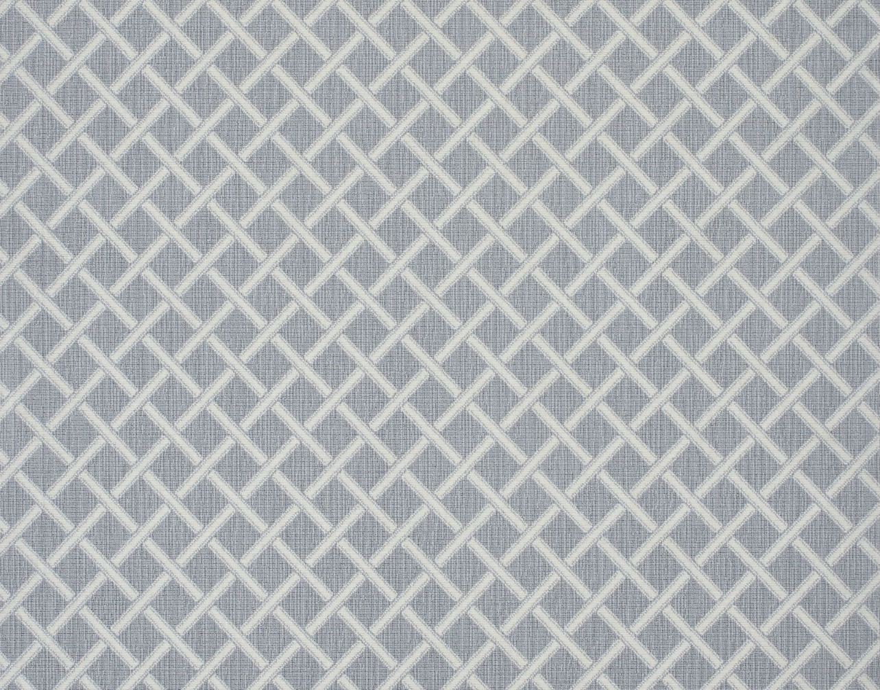 Broadloom carpet in a classic lattice in white on a cool grey field.