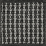 Textured woven outdoor carpet a basketweave design in black and grey.