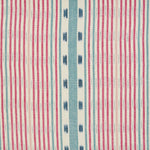 Detail of fabric in a global stripe print in pink, blue and navy on a white field.