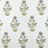 Detail of fabric in a large-scale marigold print in gray, orange and green on a cream field.