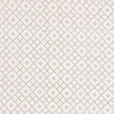 Detail of fabric in a diamond lattice print in brown on a cream field.