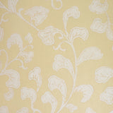 Cream leafy pattern on a yellow background