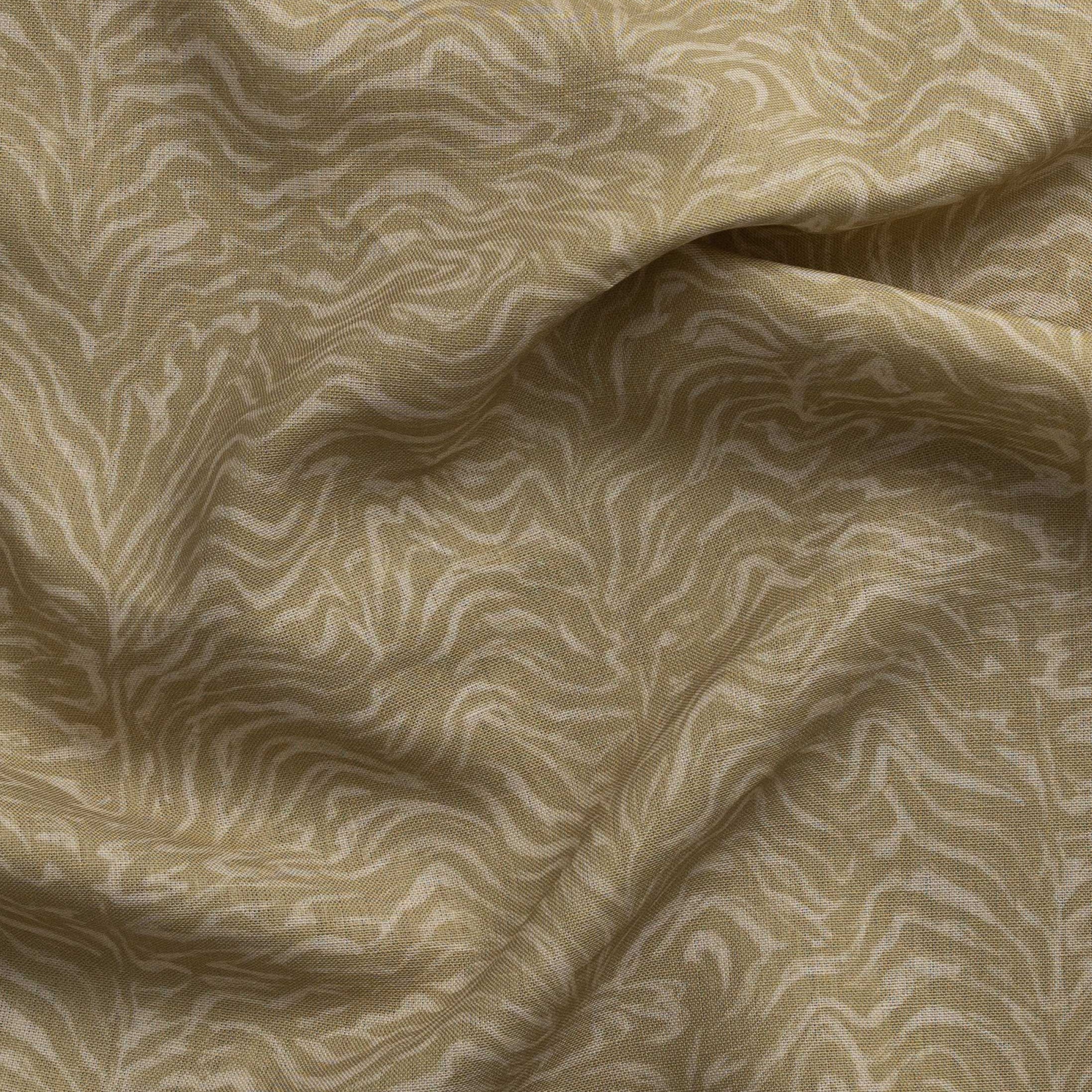 Detail of gently draped printed fabric with watercolor swirling stripe pattern in tonal muted ochre.