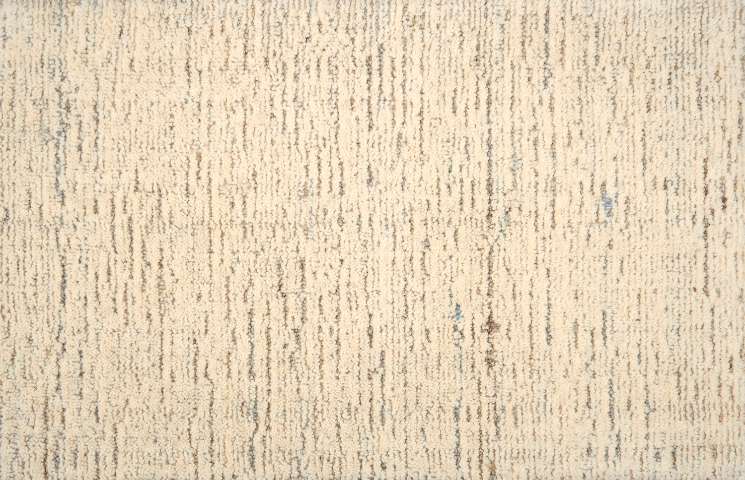 Broadloom carpet with subtle texture in cream with grey and blue accents. 