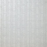 Detail of wallpaper in a textural stripe print in blue-gray.