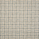 Broadloom carpet with a geometric herringbone design in cream, grey and blue.