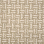Broadloom carpet with a geometric herringbone design in cream, and beige.