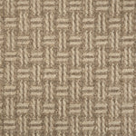 Broadloom carpet with a geometric herringbone design in brown and taupe. 