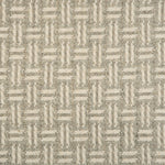 Broadloom carpet with a geometric herringbone design in cream and grey.