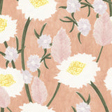 Detail of wallpaper in a playful floral print in shades of white, yellow, green and pink on a coral field.