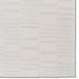 Detail of a hand-painted wallpaper swatch with an undulating ribbon pattern in ivory.