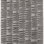 Sheet of hand-painted wallpaper with an undulating ribbon pattern in charcoal.