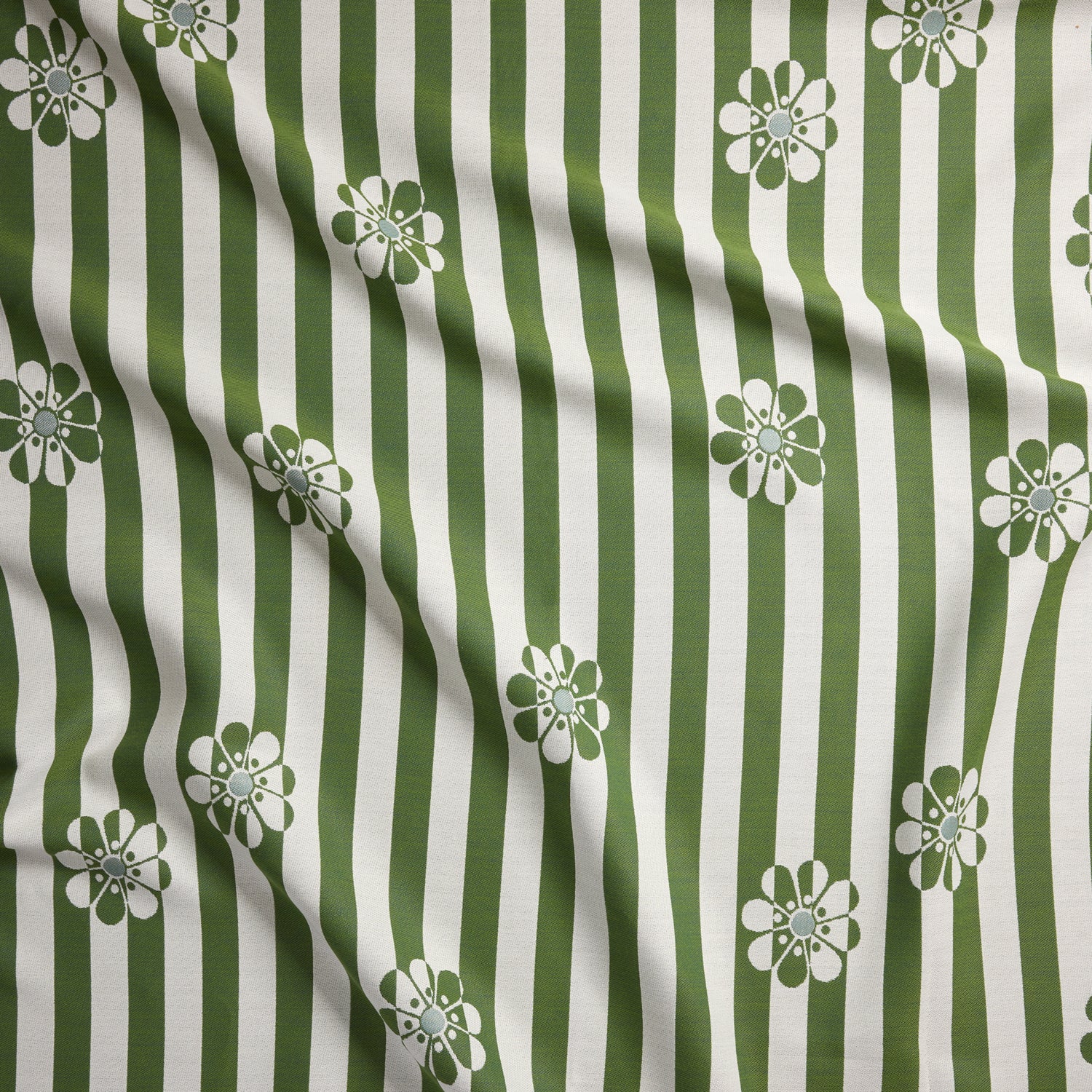 Fabric with green and white striped pattern and floral designs