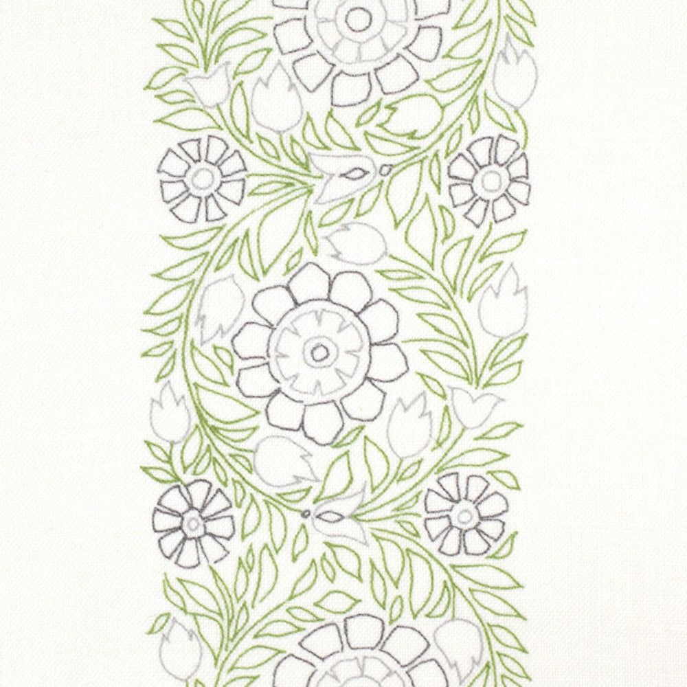 Detail of fabric in a floral stripe print in green, gray and purple on a white field.