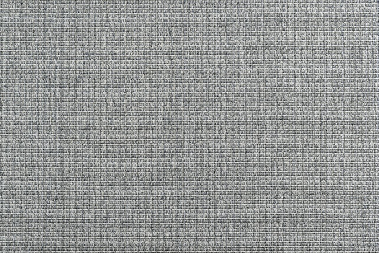 Broadloom carpet in a ribbed stripe in cool blue.