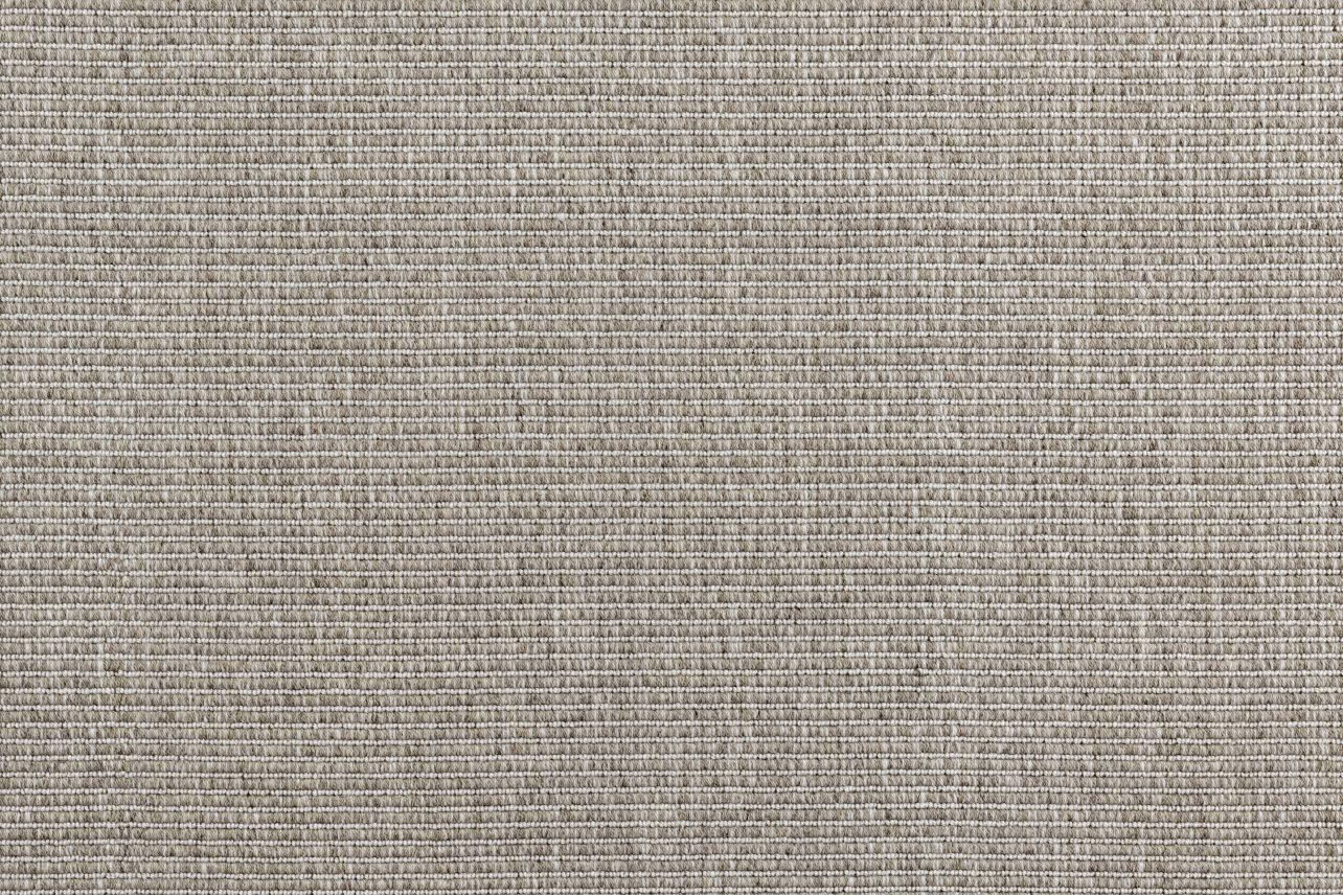 Broadloom carpet in a ribbed stripe in warm grey. 