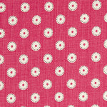 Detail of fabric in a playful dot print in cream and charcoal on a maroon field.