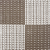 Indoor-Outdoor rug in a graphic checkerboard in white and brown.