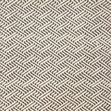Indoor-Outdoor rug in a diamond basket weave in white and brown.