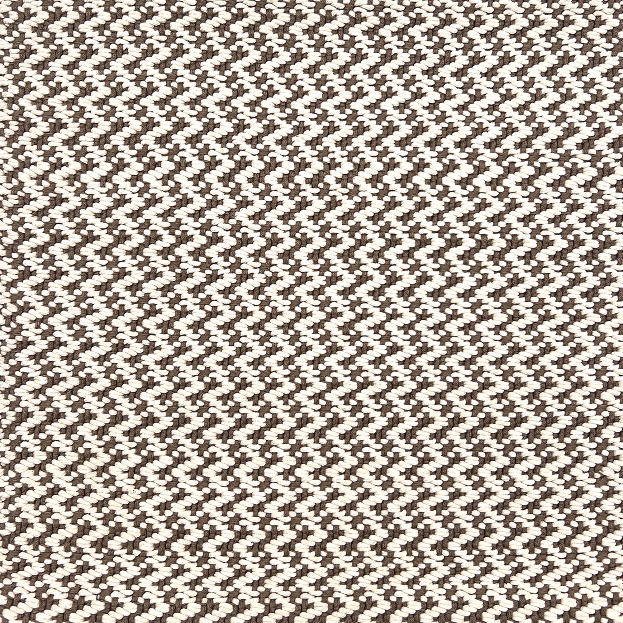 Indoor-Outdoor rug in a small scale zig zag stripe in white and brown.