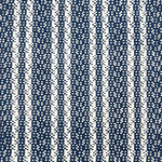 Indoor-Outdoor rug in a woven stripe in white and blue. 