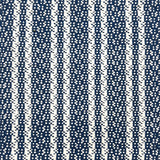 Indoor-Outdoor rug in a woven stripe in white and blue. 