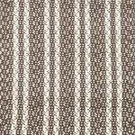 Indoor-Outdoor rug in a woven stripe in white and brown.
