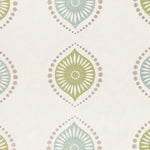 Fabric with a repeating floral print in blue, green and tan on a cream field.