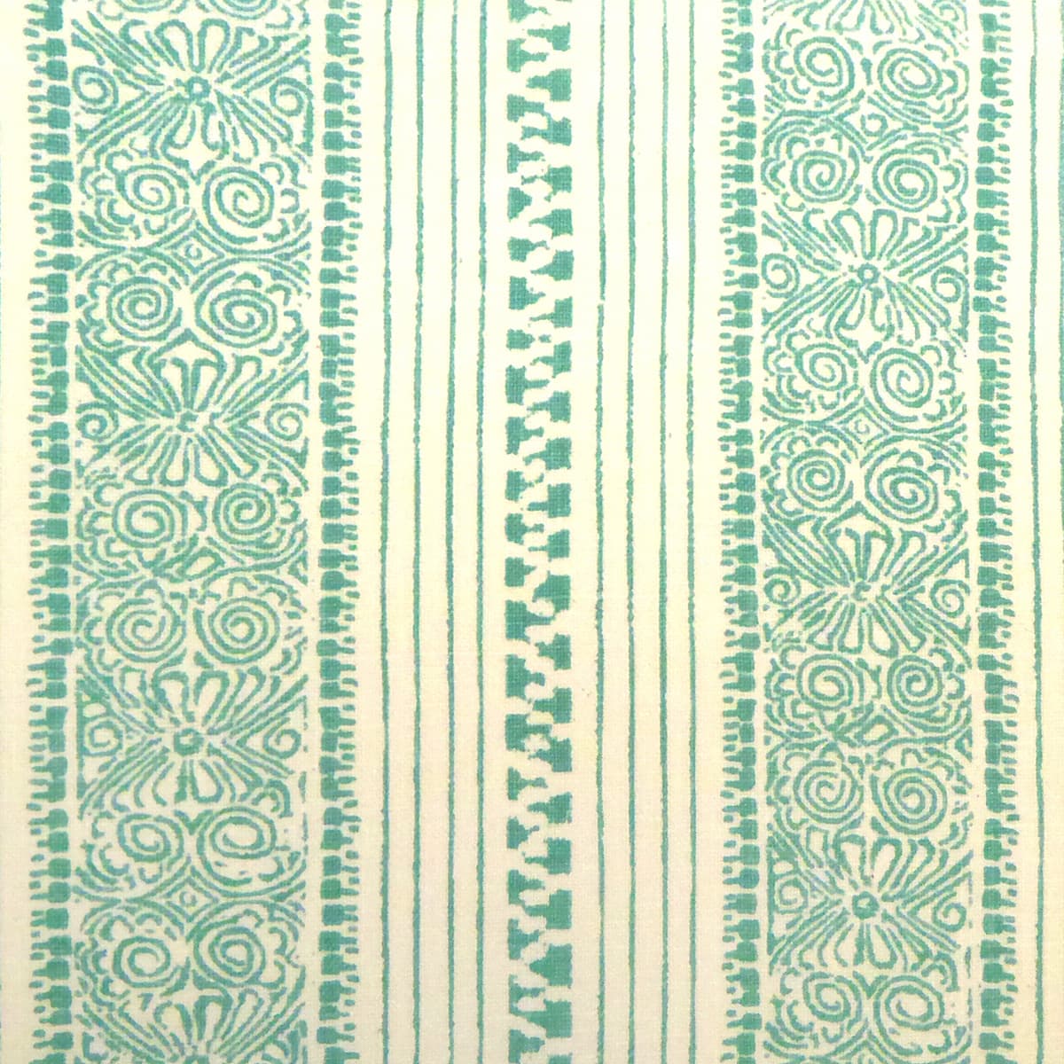 Detail of fabric in a botanical stripe print in turquoise on a cream field.