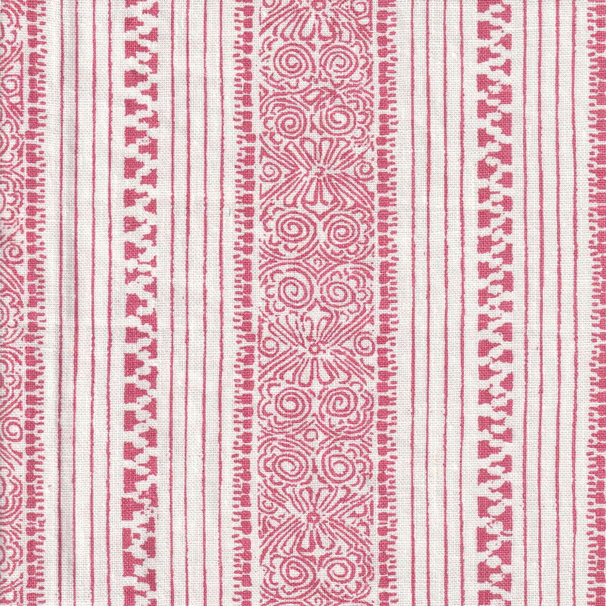 Detail of fabric in a botanical stripe print in pink on a white field.
