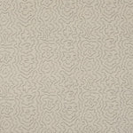 Detail of fabric in a minimalist wood grain print in gray on a cream field.