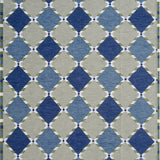 Handwoven rug in a Swedish diamond lattice design shades of green and blue with white accents. 
