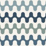 Detail of wallpaper in a playful curving stripe print in shades of green, blue and gray on a white field.